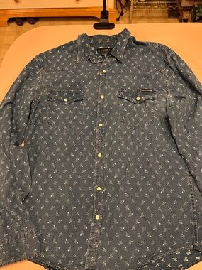 Lucky Brand women’s shirt with floral print and snaps.
